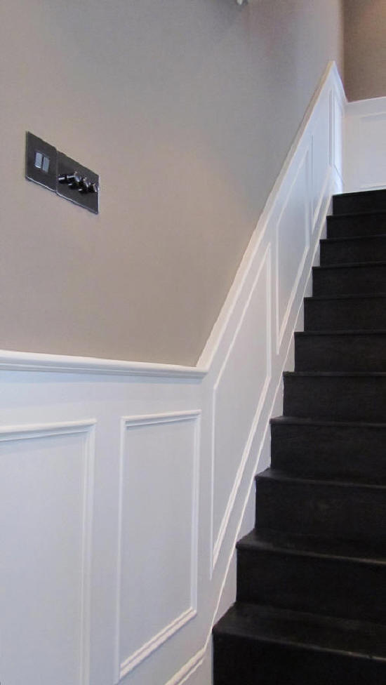 Heritage-Panelling-on-stairs-painted-white-with-heritage-dado-rail-Skirting